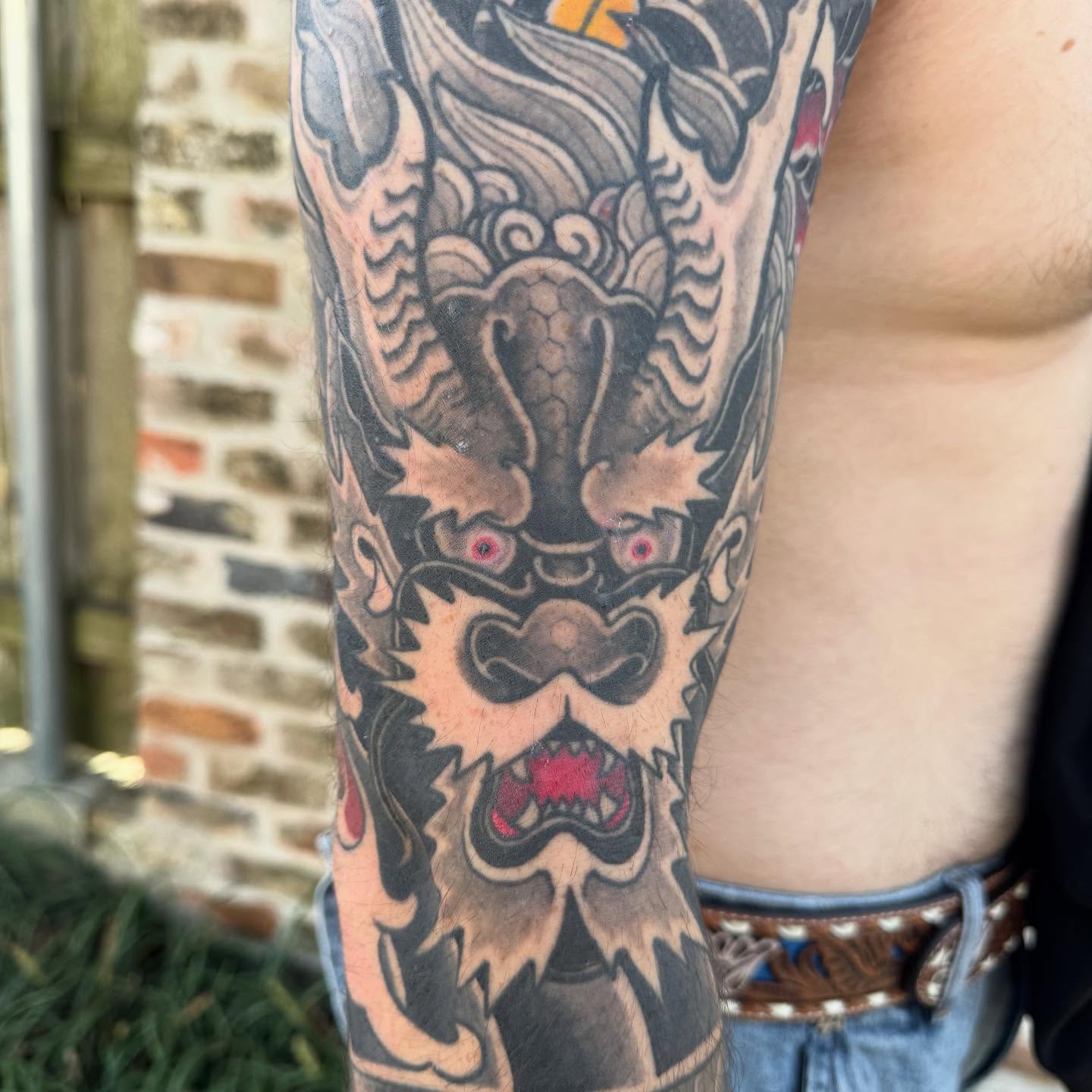 Demon mask japanese irezumi tattoo on the forearm by Jeremy Justice, New Orleans, Louisiana