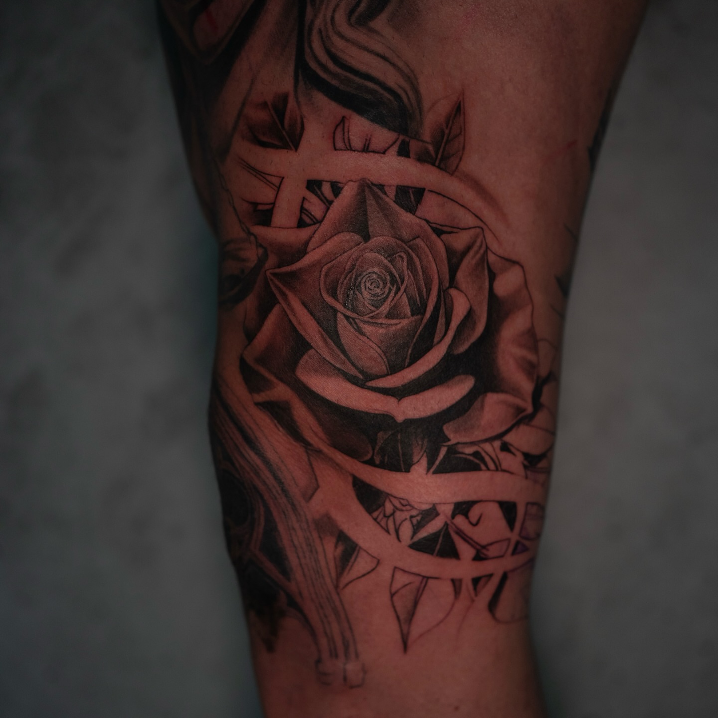 Rose realism tattoo on the forearm by Damon Valdez