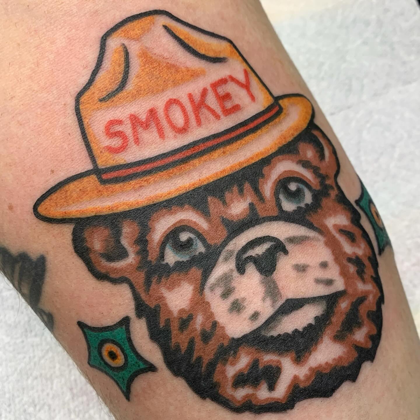 Smokey bear American traditional tattoo on the forearm by Los Angeles Tattoo Artist