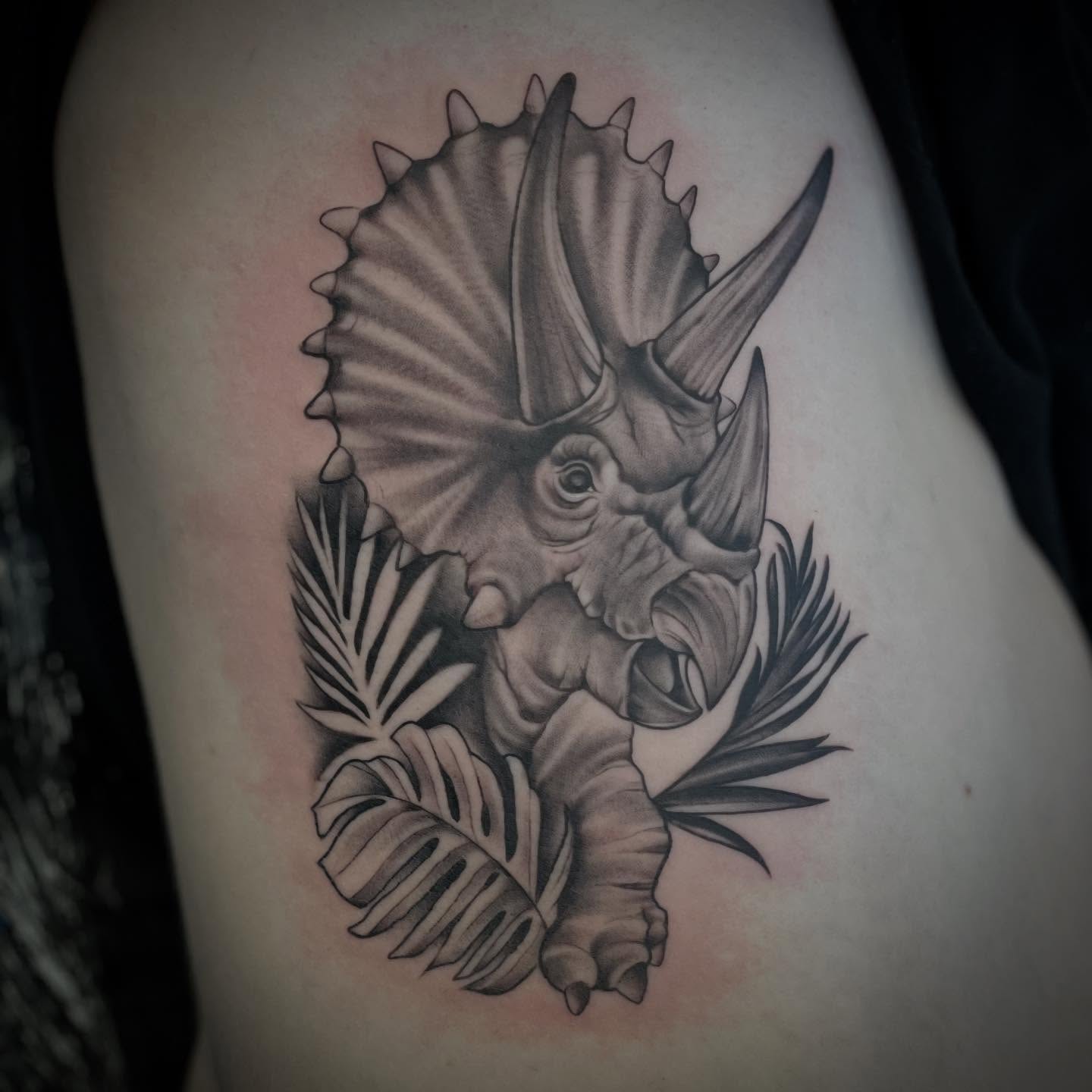 Triceratops black and grey tattoo on the thigh by ๐ณ๐๐๐๐ข ๐ต๐๐๐๐๐๐