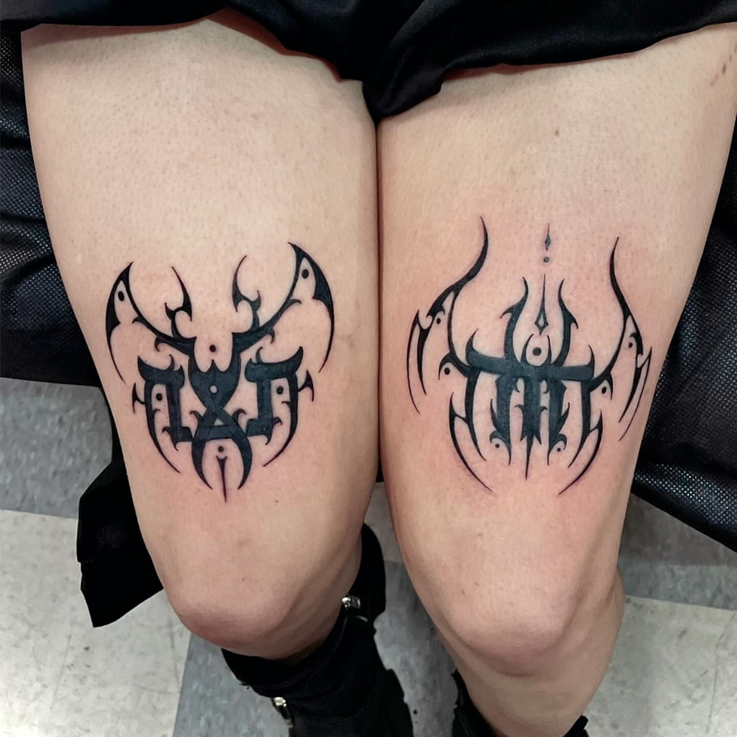 Tribal design tribal tattoo on the thigh by Manny
