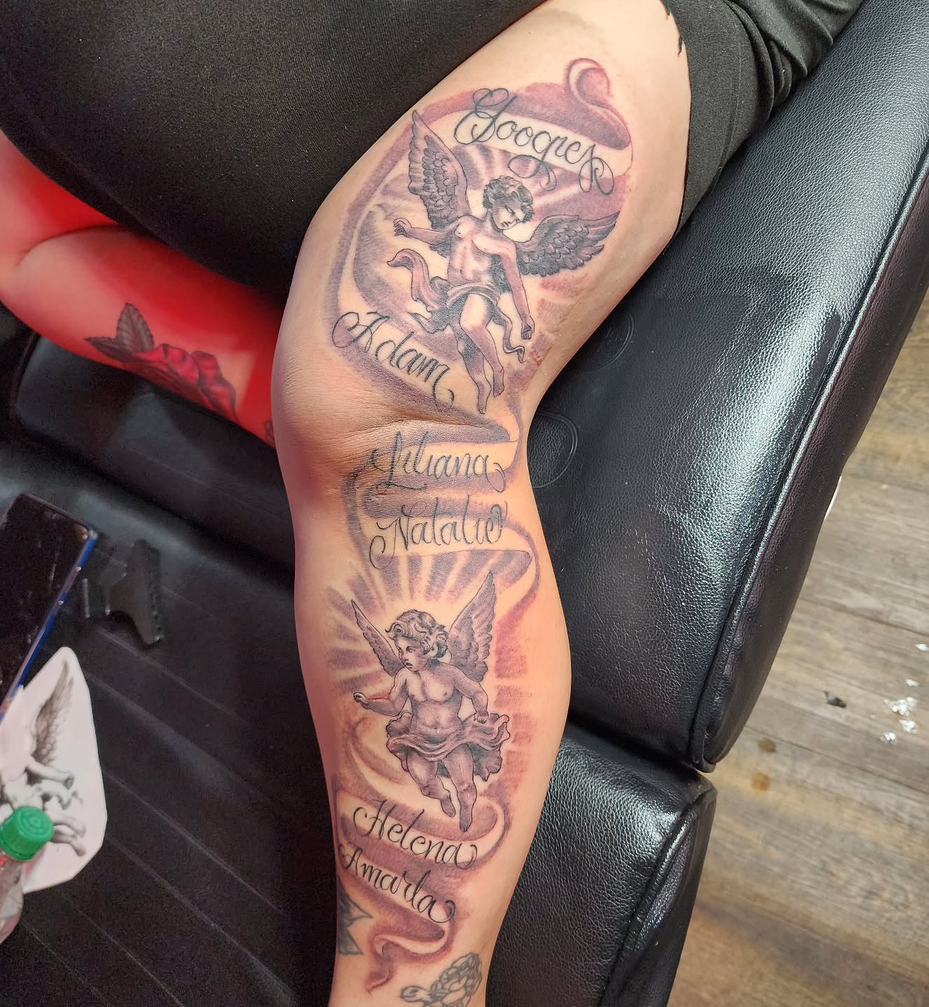 Cherubs American traditional tattoo on the forearm by Joe Garcia