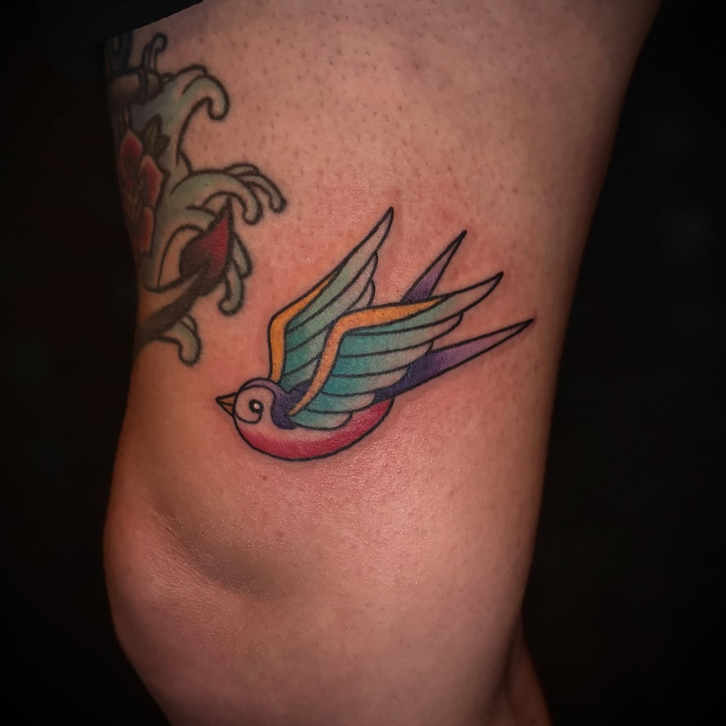 Swallow American traditional tattoo on the forearm by Lauren Dempsey, Dearborn, Michigan