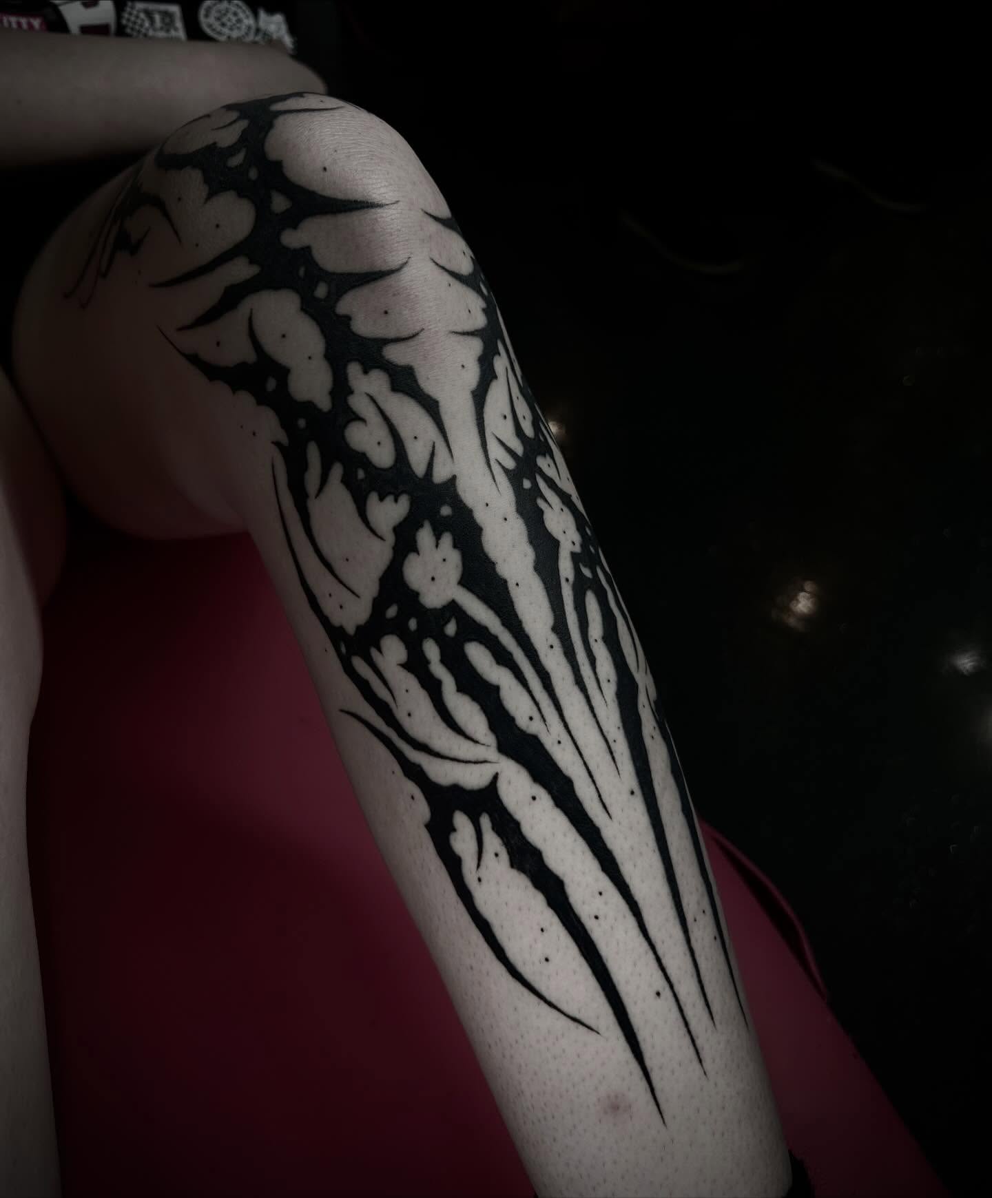 Abstract design black and grey tattoo on the forearm by Heaven Arianna