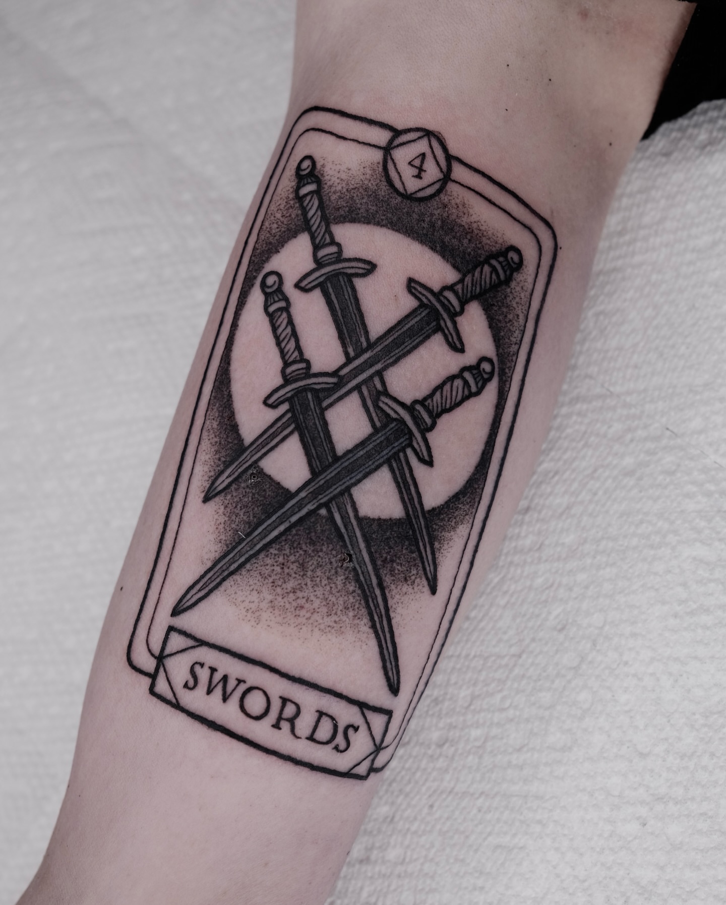 Swords dotwork tattoo on the forearm by Kyle Patrick