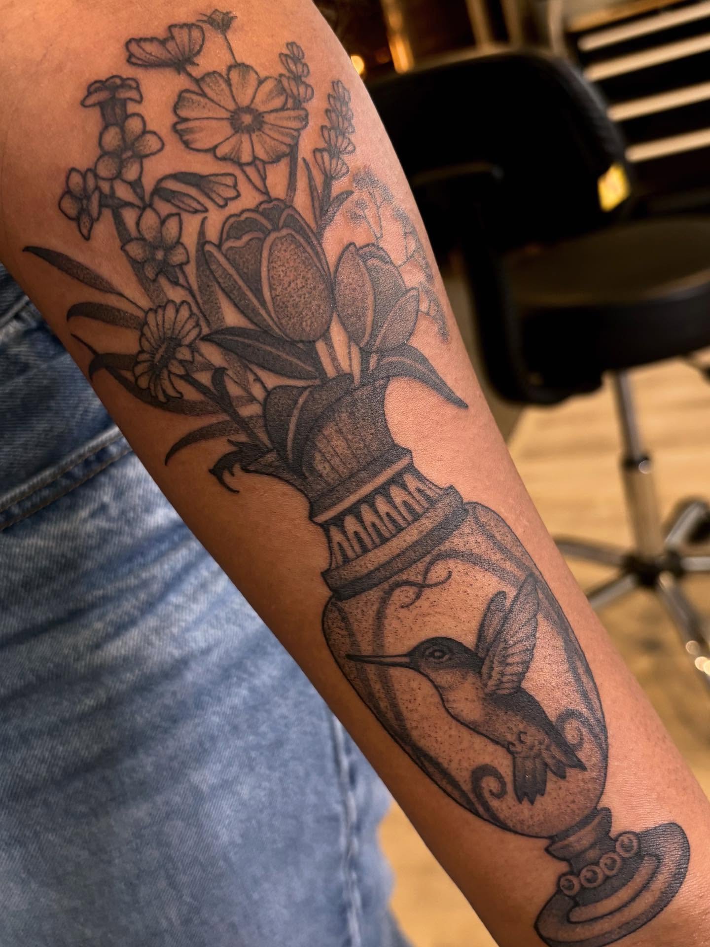 Flower vase with hummingbird American traditional tattoo on the forearm by Tara, Exeter, Pennsylvania