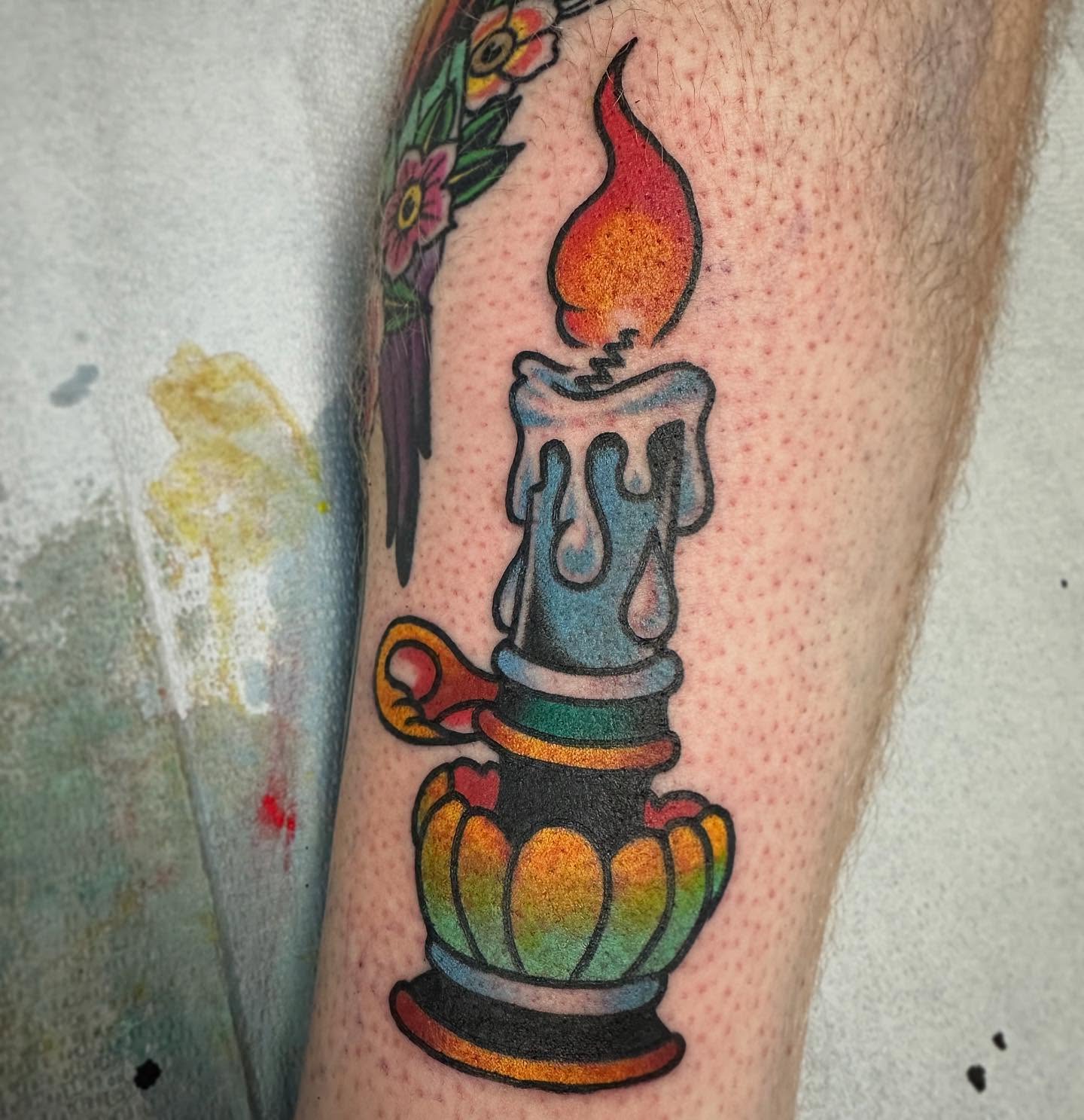 Candle American traditional tattoo on the forearm by Devin Spenny