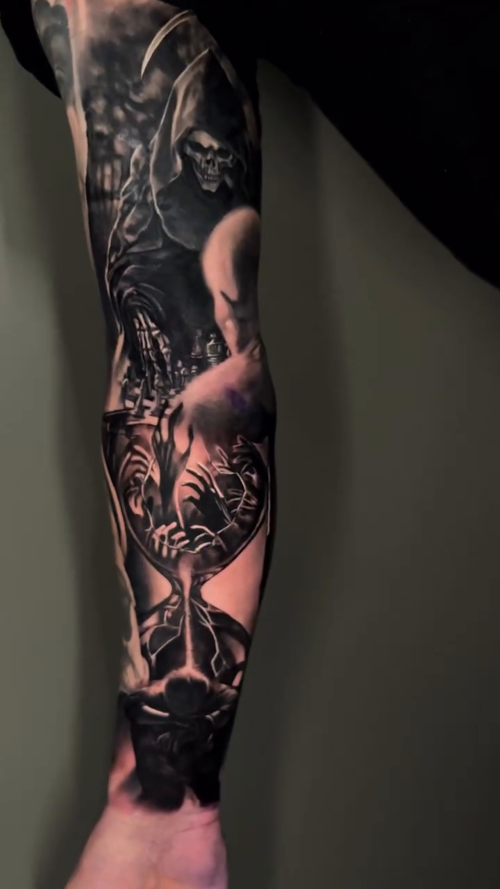 Grim Reaper and hourglass dark realism tattoo by Dakota Case
