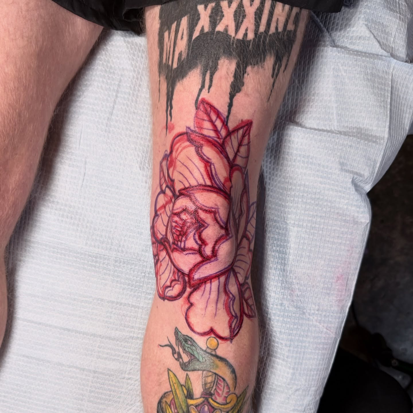 Peony flower American traditional tattoo on the forearm by Sideshow Danny