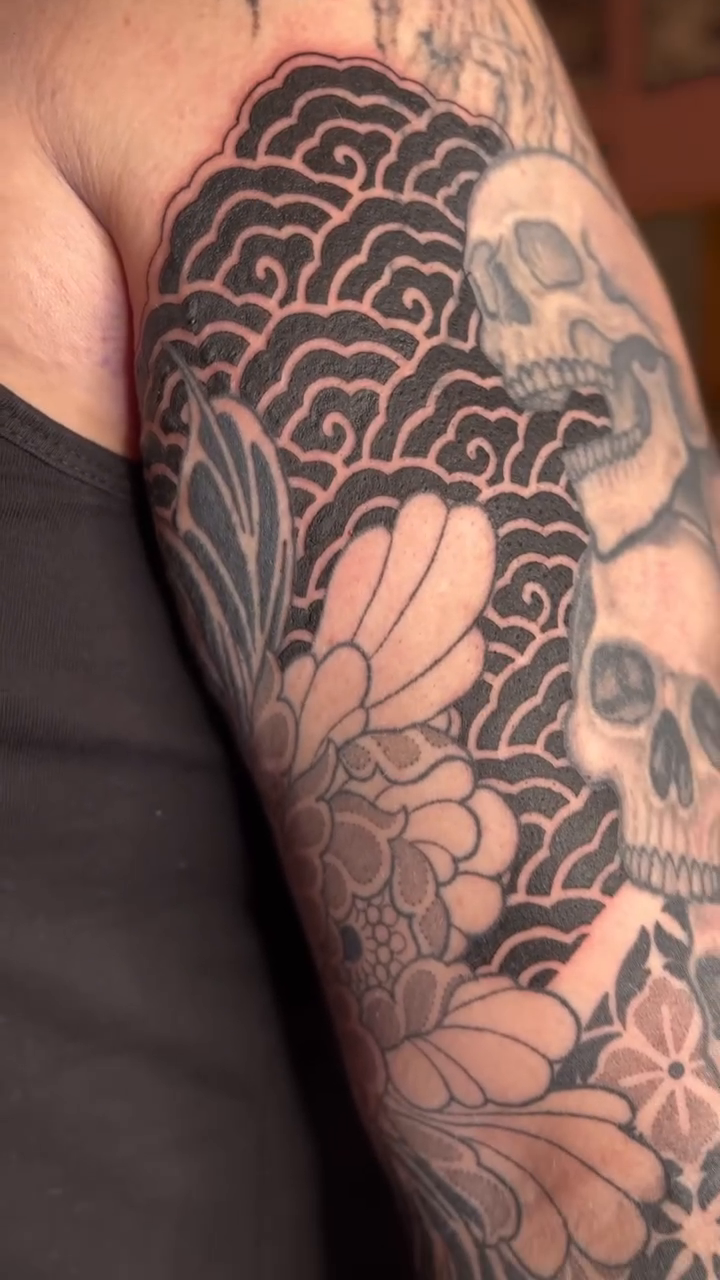 Skull and flowers japanese irezumi tattoo by Storm Smith