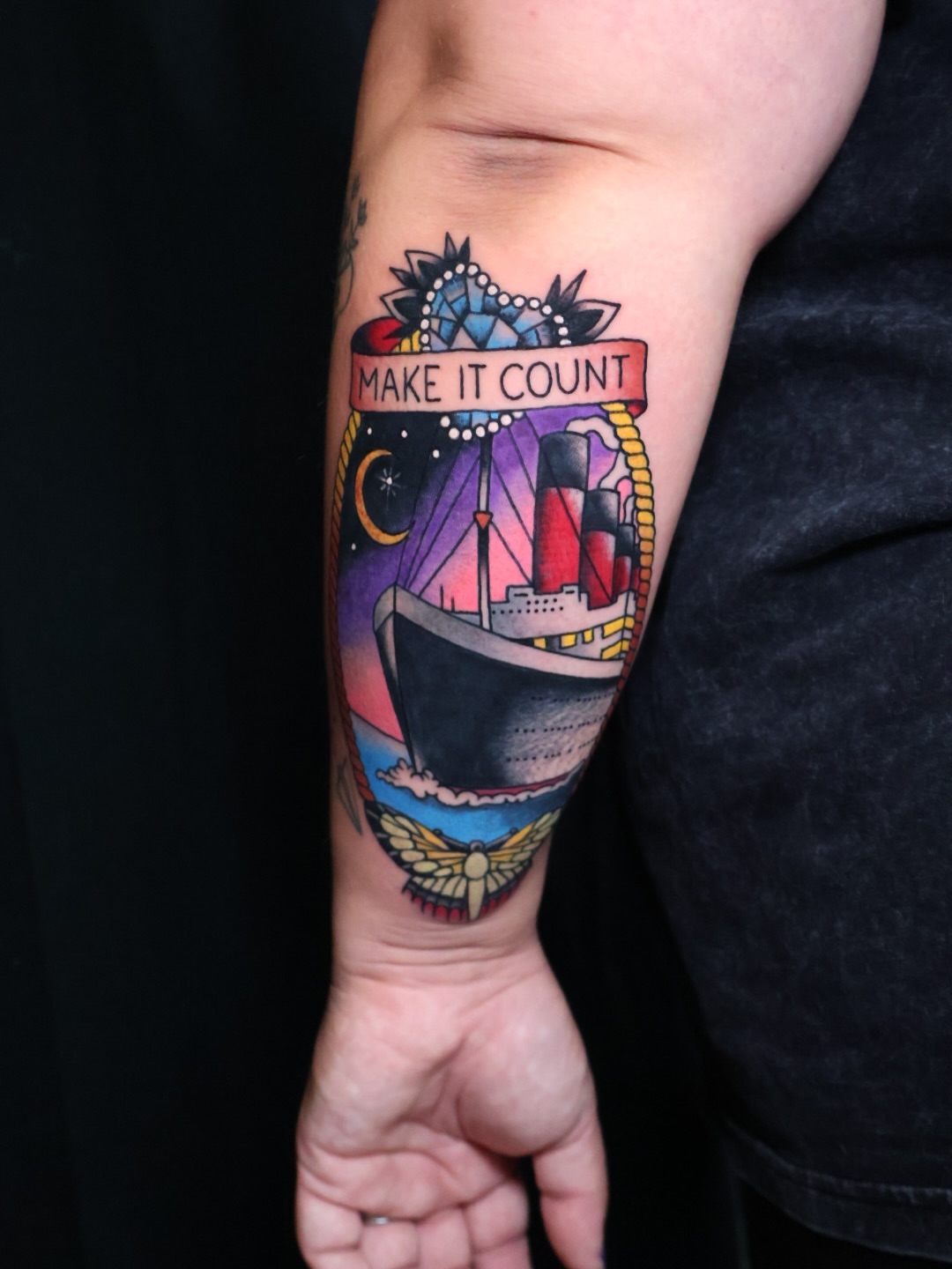 Ship and moon American traditional tattoo on the forearm by Brandon Bear