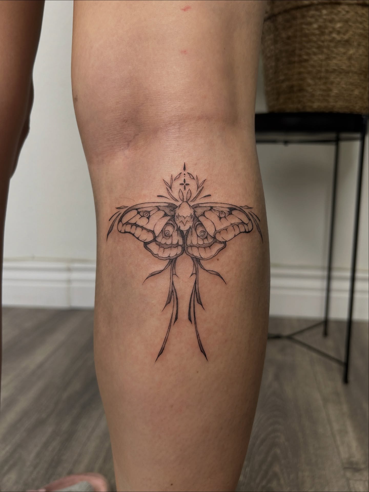 Moth geometric tattoo on the forearm by Miri