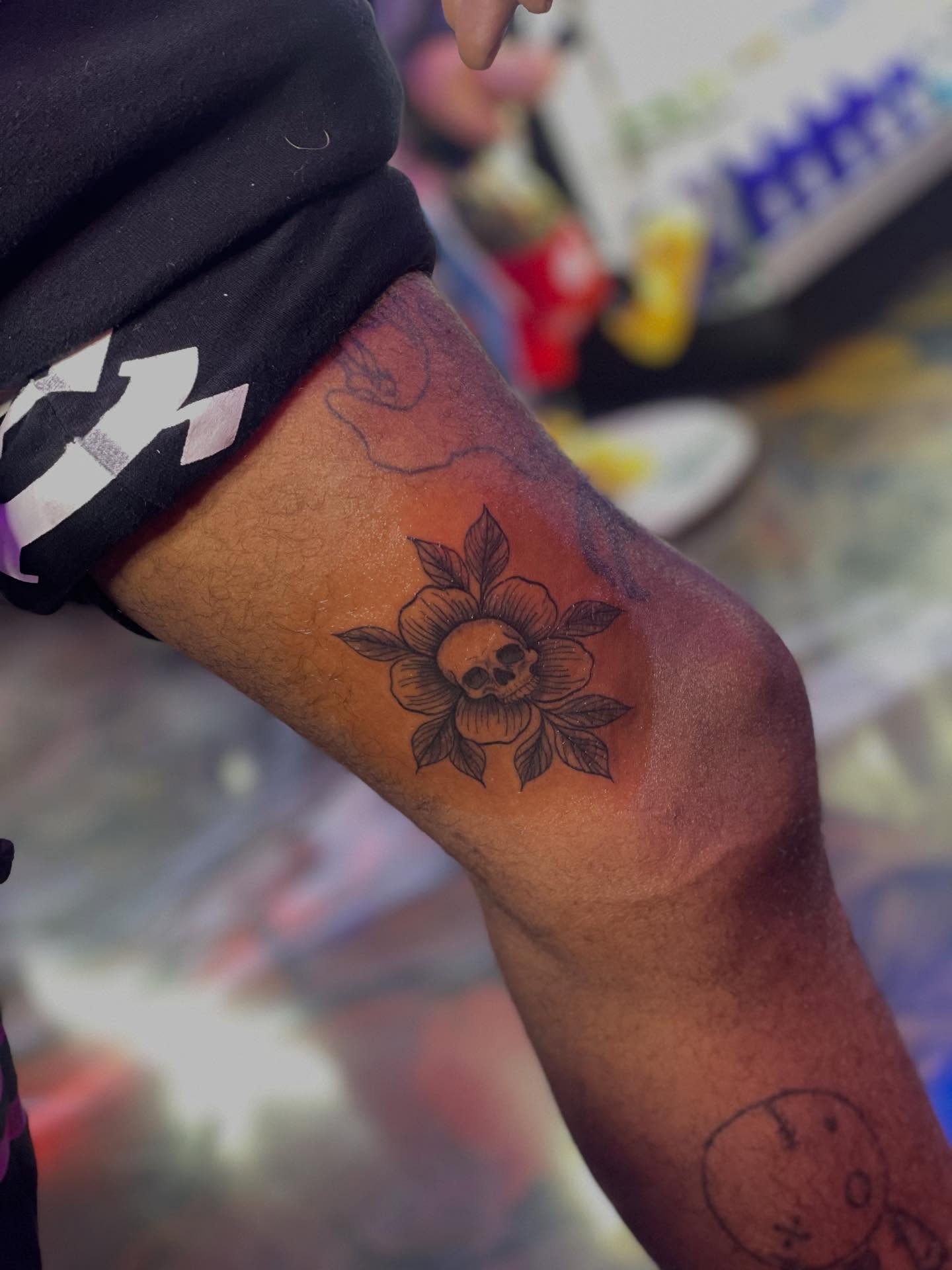 Flower with skull black and grey tattoo on the forearm by 😈headhuncho😈