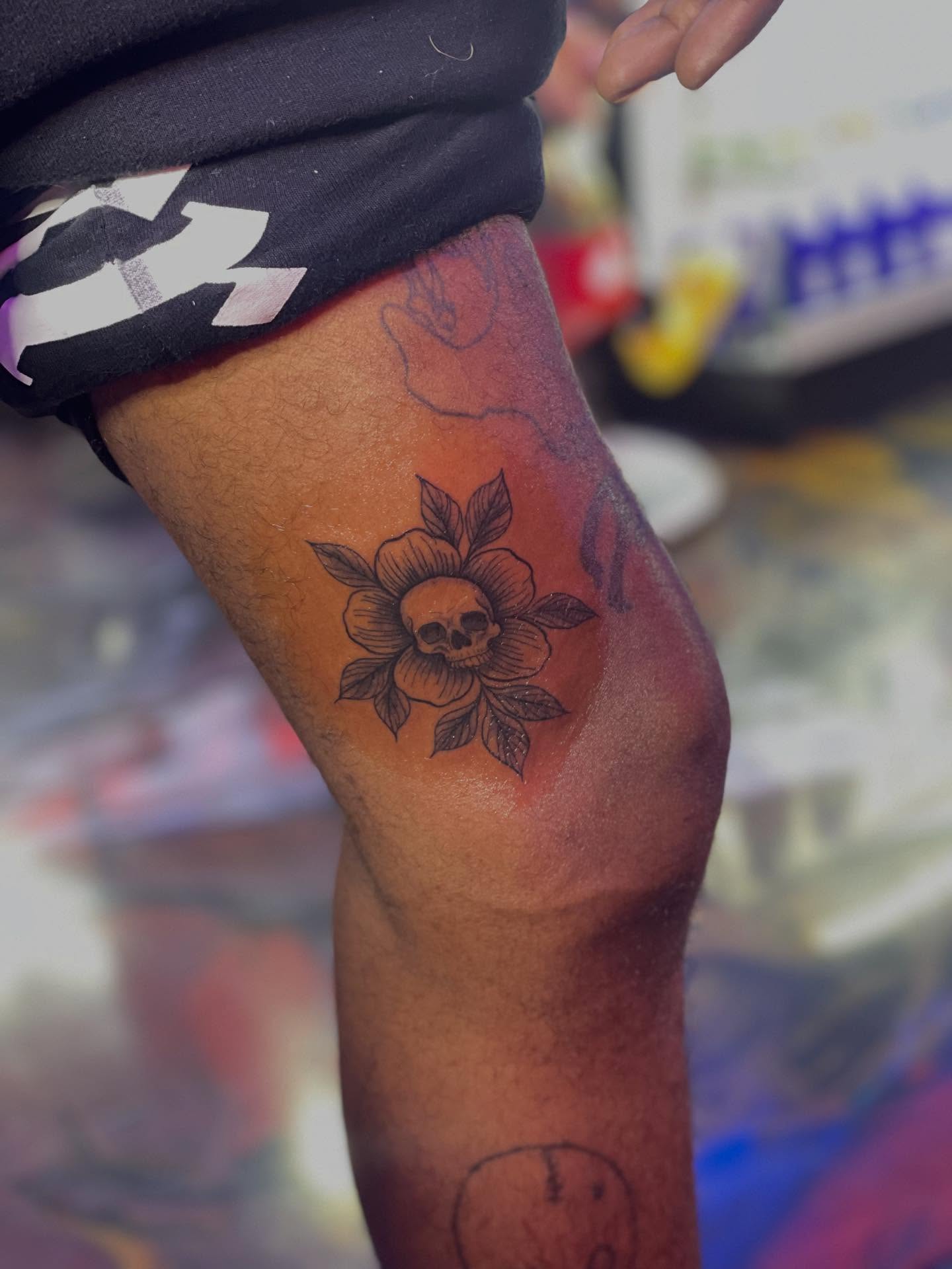 Skull and flower American traditional tattoo on the forearm by 😈headhuncho😈