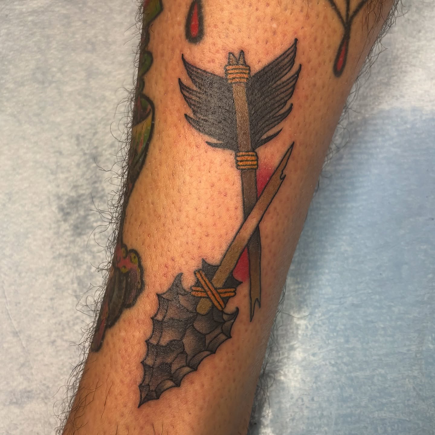 Arrow and spear American traditional tattoo on the forearm by Adam Bailey, Portland, Oregon