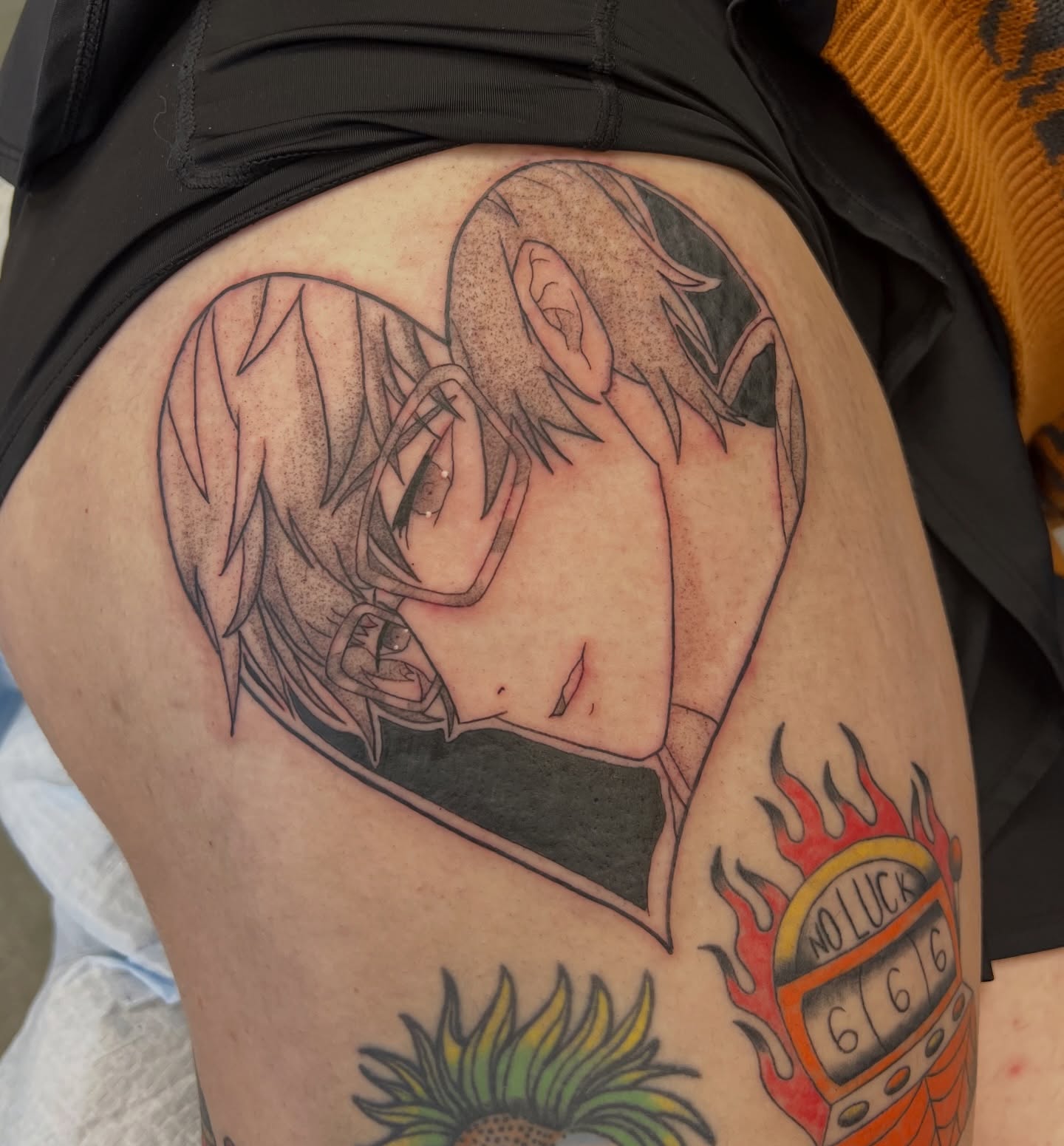 Anime character anime tattoo on the thigh by Leslie Paskoff