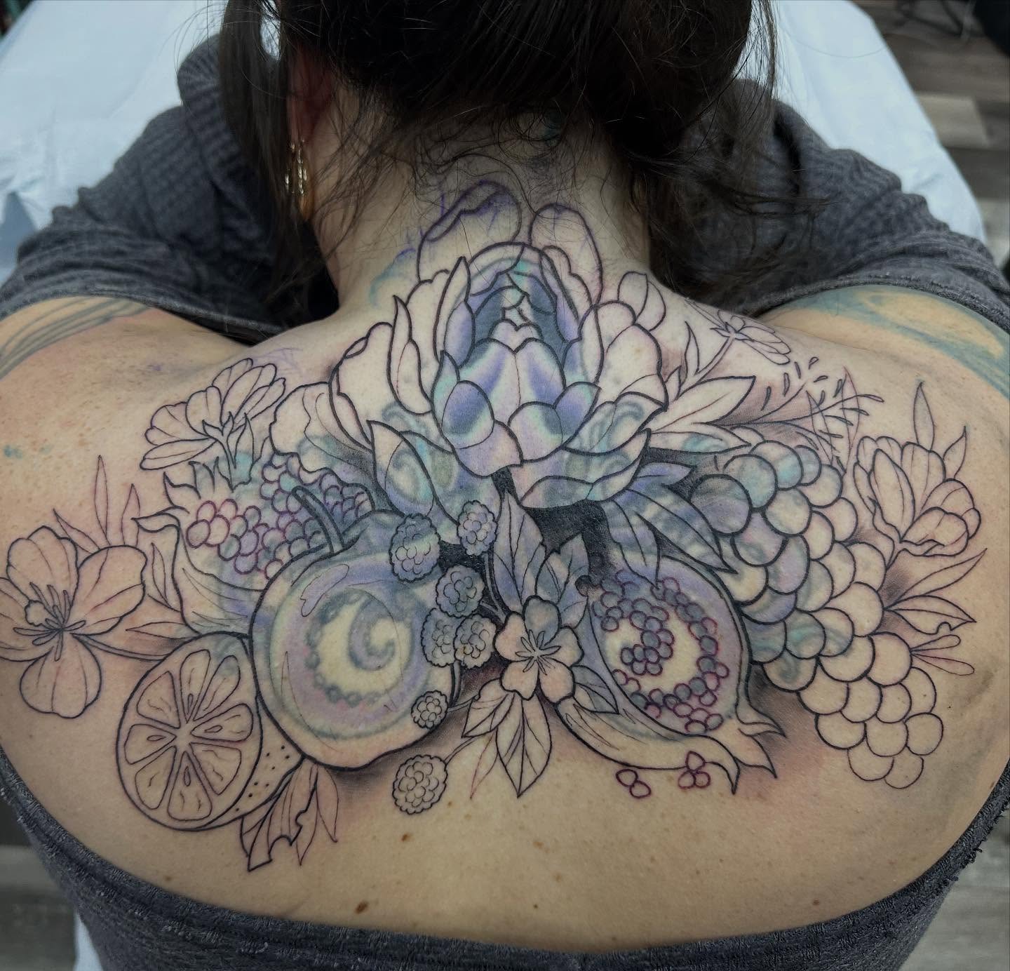 Floral bouquet black and grey tattoo on the back by Halle Haas