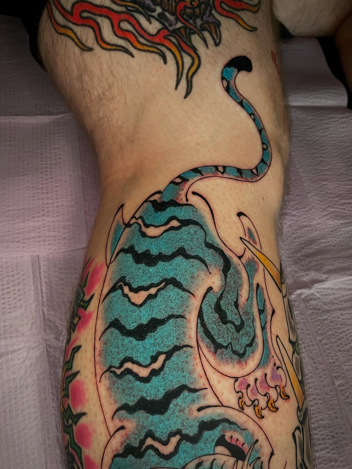 Tiger American traditional tattoo on the forearm by Bryan Ortega