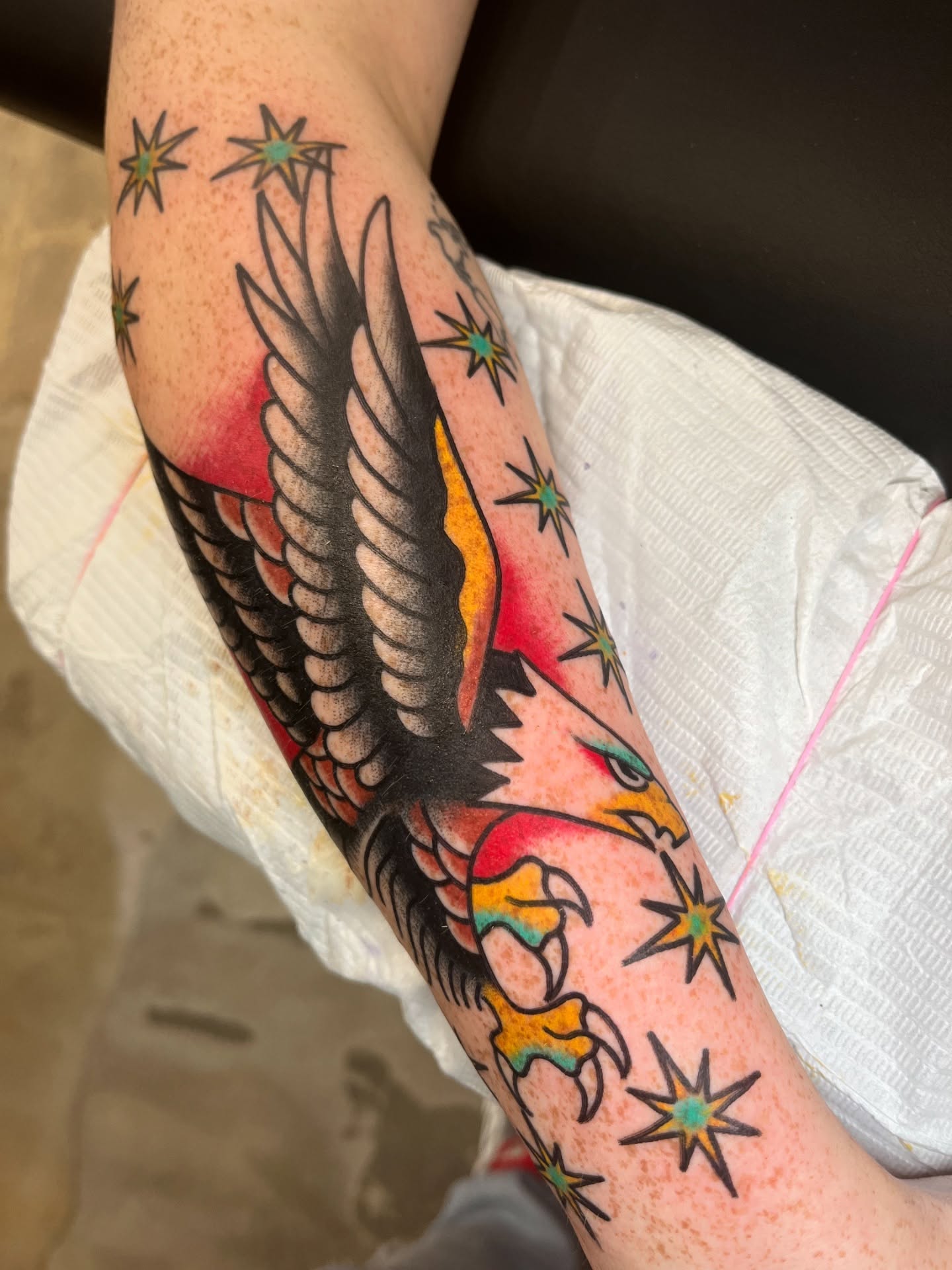Eagle American traditional tattoo on the forearm by Tim Howell