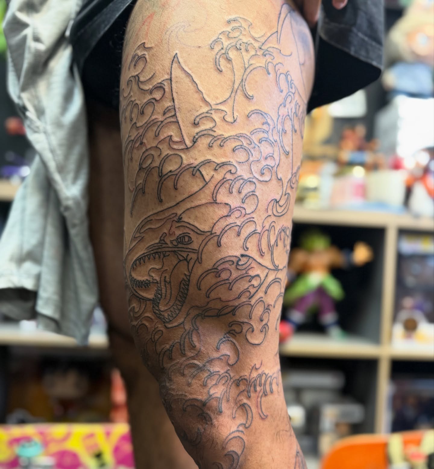 Dragon and waves japanese irezumi tattoo on the forearm by Zack Yang, Houston, Texas