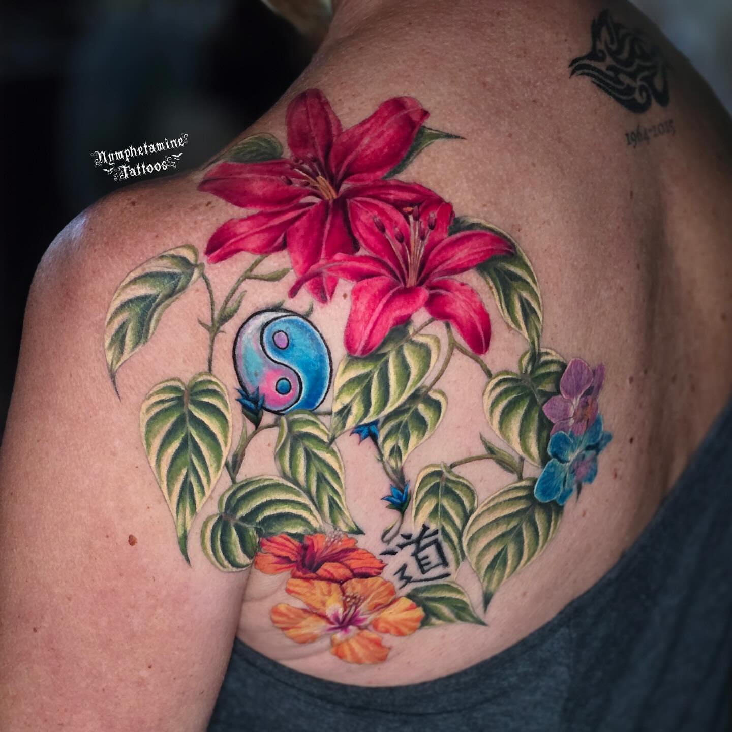 Lilies and yin-yang realism tattoo on the shoulder by ๐ธ๐๐๐๐๐๐๐๐