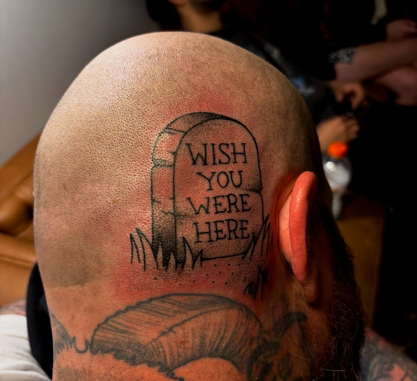 Gravestone black and grey tattoo on the head by Dyllan Shipley