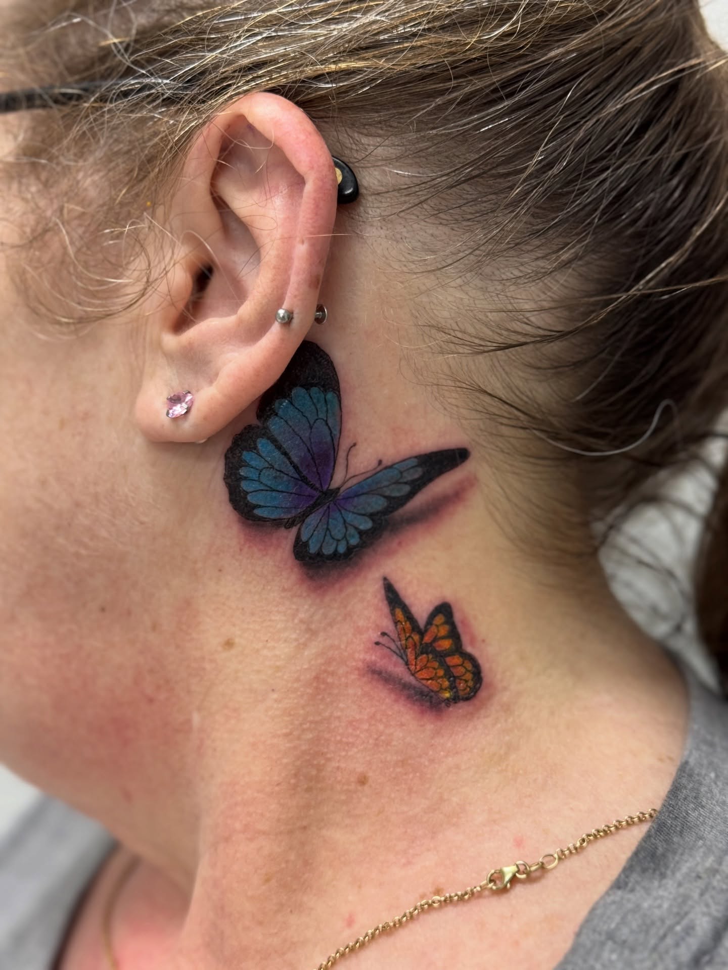 Butterfly realism tattoo on the neck by Lacee-Beth Finch