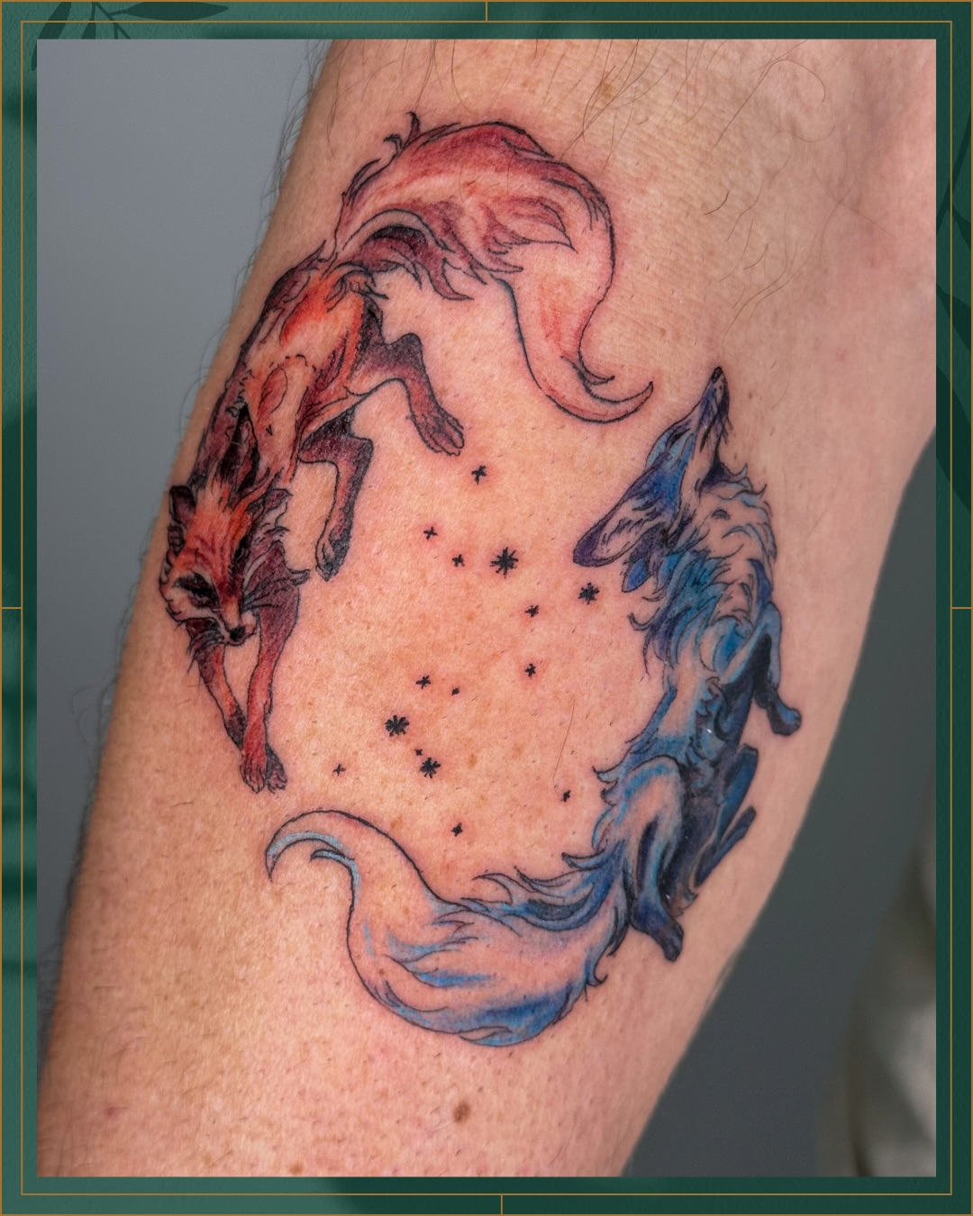 Foxes and constellation dotwork tattoo on the forearm by Tiffany