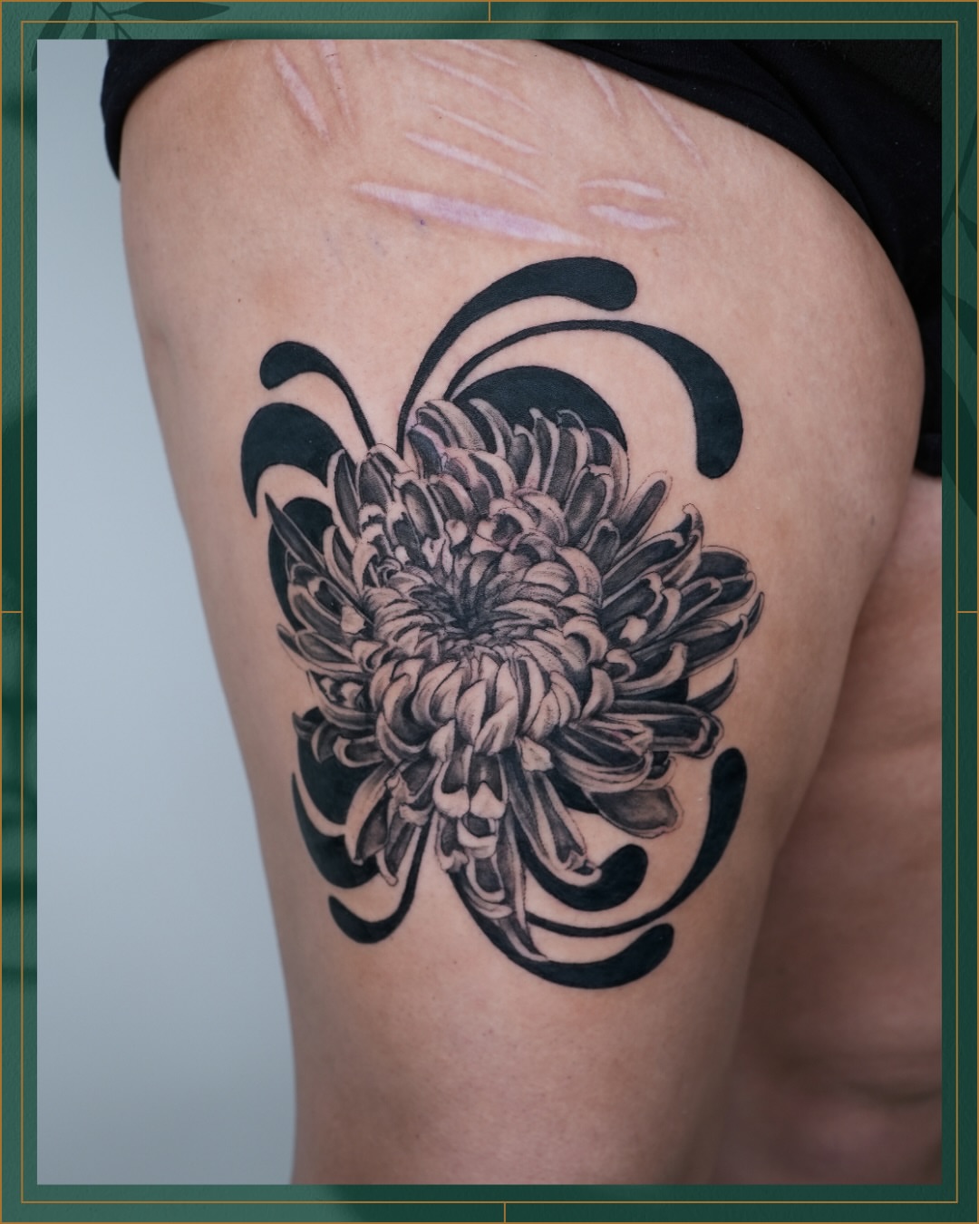Chrysanthemum black and grey tattoo on the thigh by Tiffany