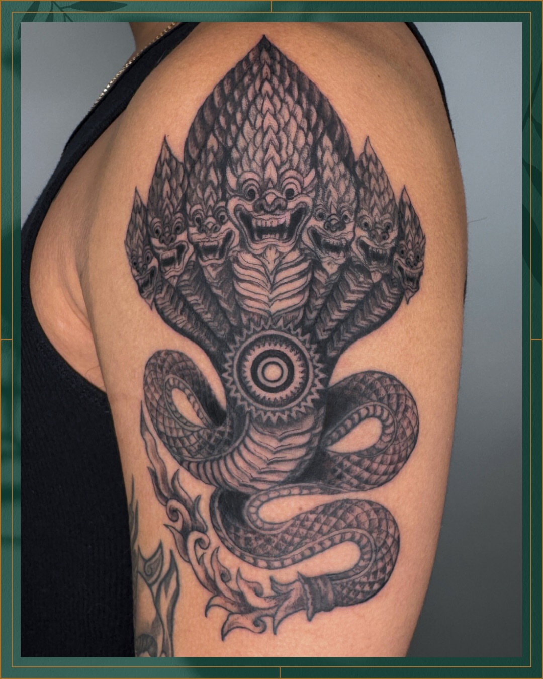 Multi-headed snake geometric tattoo on the shoulder by Tiffany