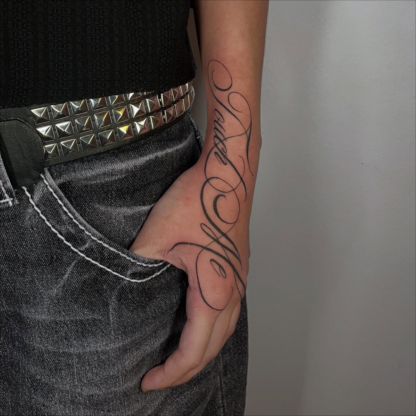 Script lettering lettering script tattoo on the forearm by Sophia Tattoo