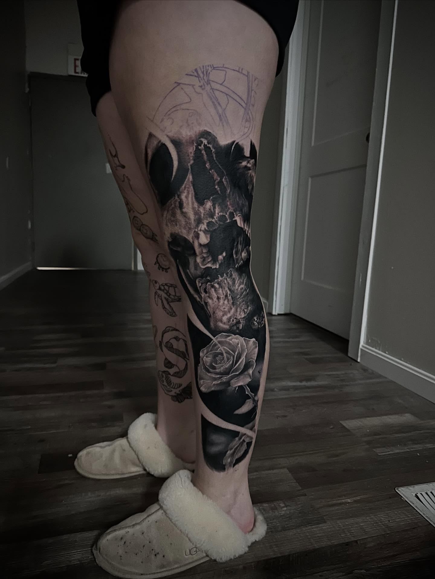 Skull and rose realism tattoo on the calf by Neil5one3