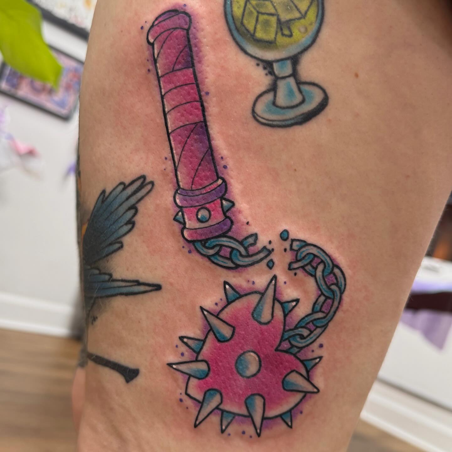 Sword and spiked ball American traditional tattoo on the forearm by Chelsea Graham, Seattle, Washington