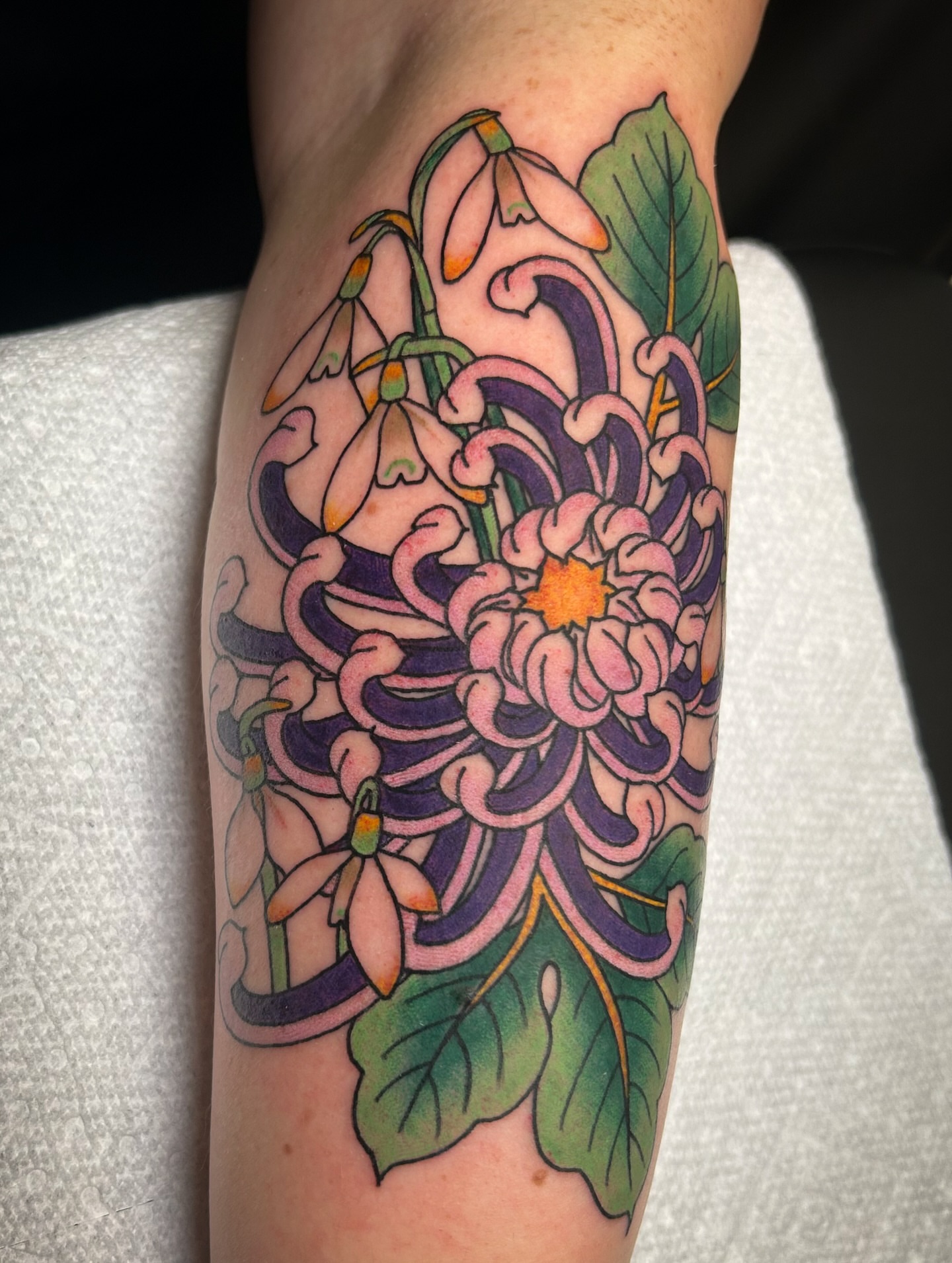 Chrysanthemum new school tattoo on the forearm by Jessica Oram Brockman, Dayton, Ohio