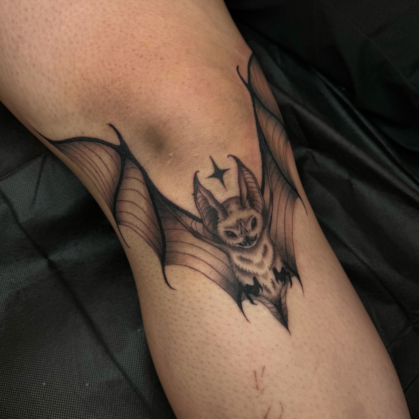 Bat black and grey tattoo on the forearm by โโฎโ๐ถ๐๐ฝ๐๐๐ู เฃชโญ las vegas tattoo artist