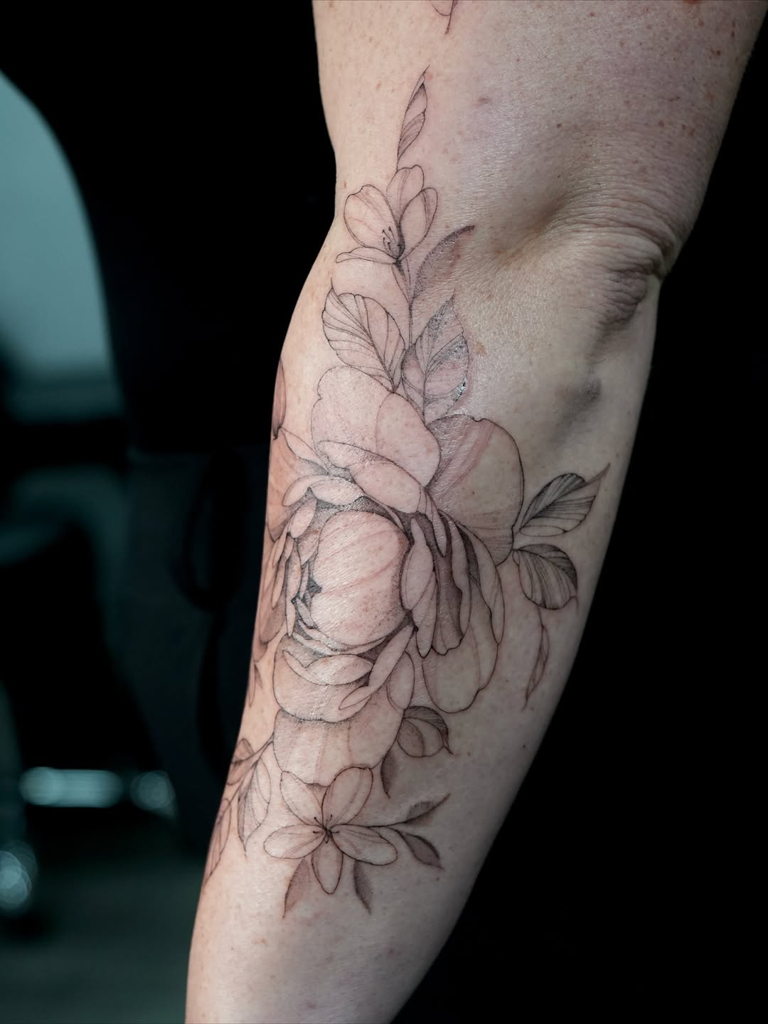 Floral arrangement sketch tattoo on the forearm by Nyc Tattoo Manhattan