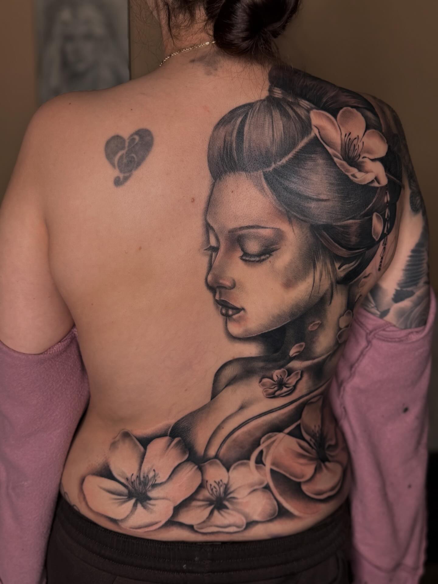 Geisha portrait realism tattoo on the back by Jas Knight