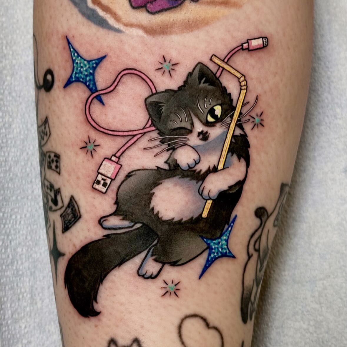 Kitten with USB cable new school tattoo on the forearm by πππ£π£π β‘β§βΛ