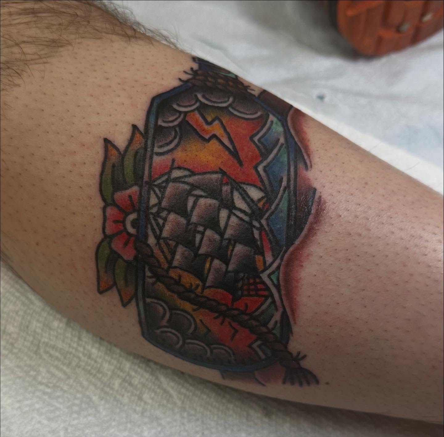 Ship in storm American traditional tattoo on the forearm by norawillstattoo