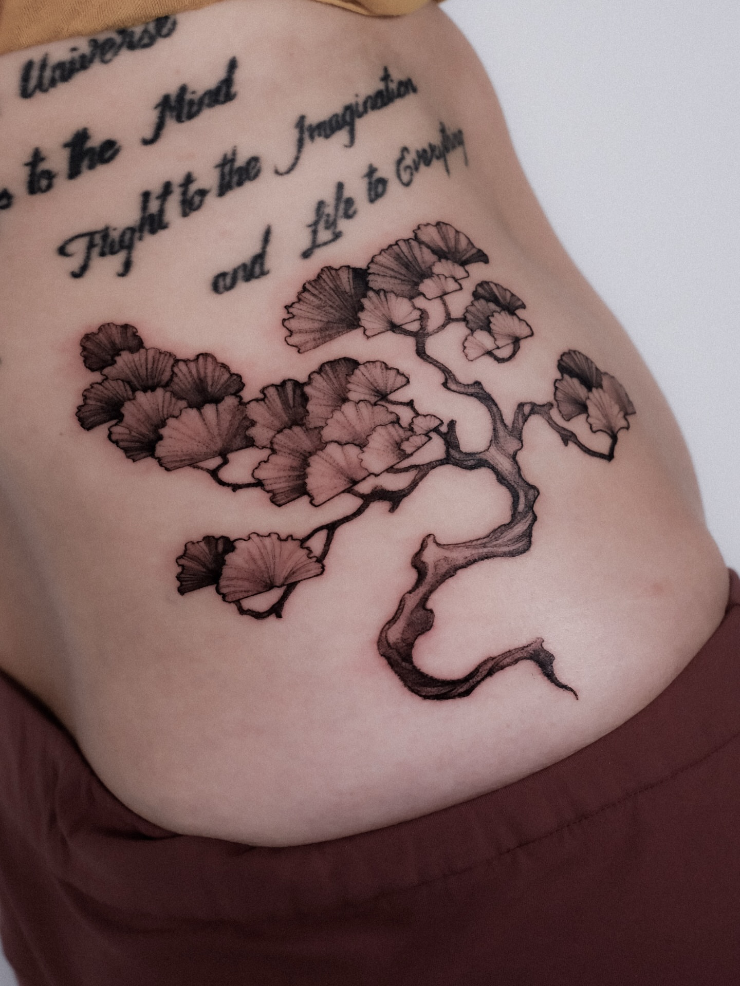 Tree branch black and grey tattoo by Alena Zozulenko