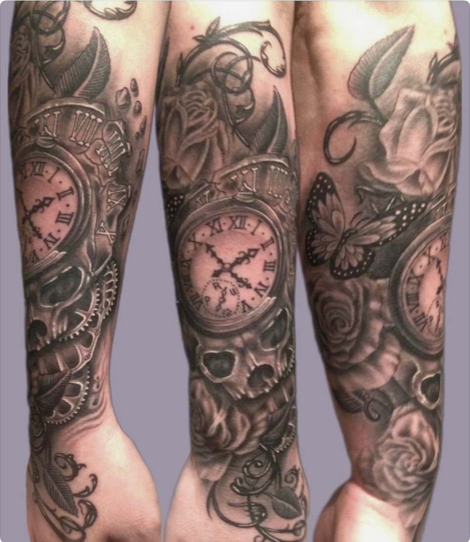 Clocks and roses realism tattoo on the forearm by Shane Montie, Killeen, Texas