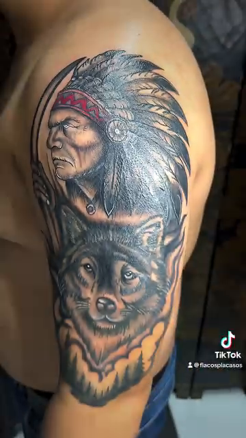 Native American chief and wolf realism tattoo by Eli Flores