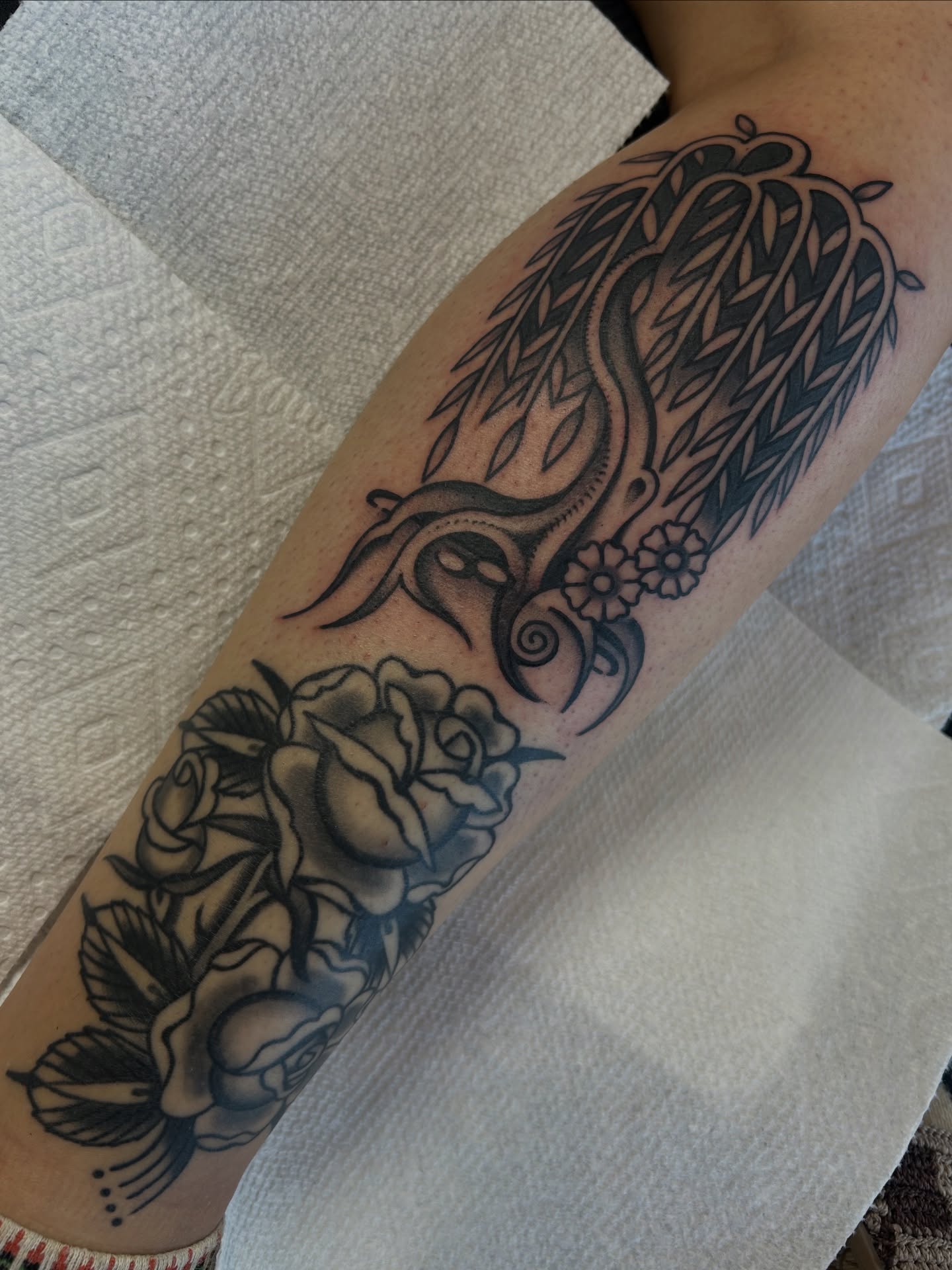 Roses and willow black and grey tattoo on the forearm by Lilly Binns