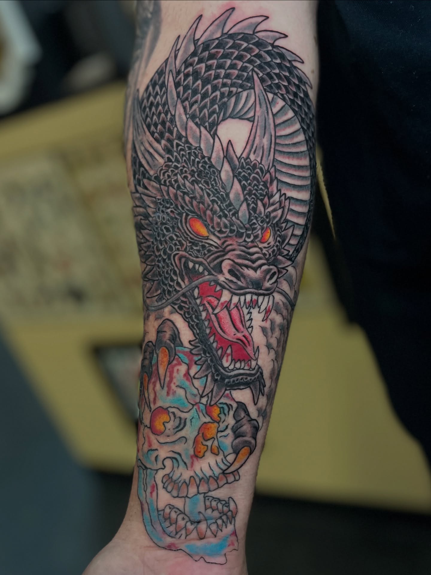 Dragon and skull japanese irezumi tattoo on the forearm by Bre