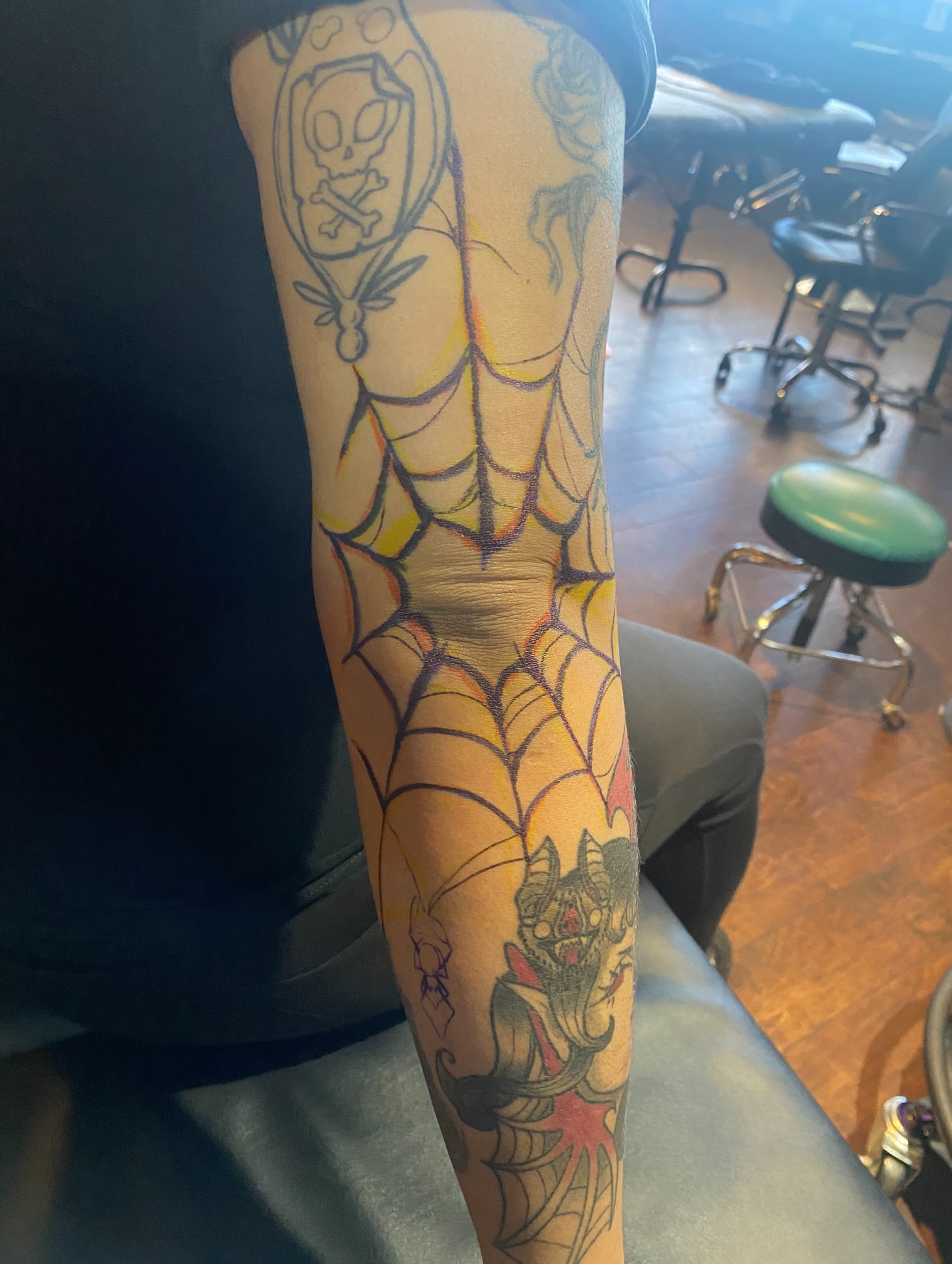 Spider web dotwork tattoo on the forearm by Elliot Jaye Valentine