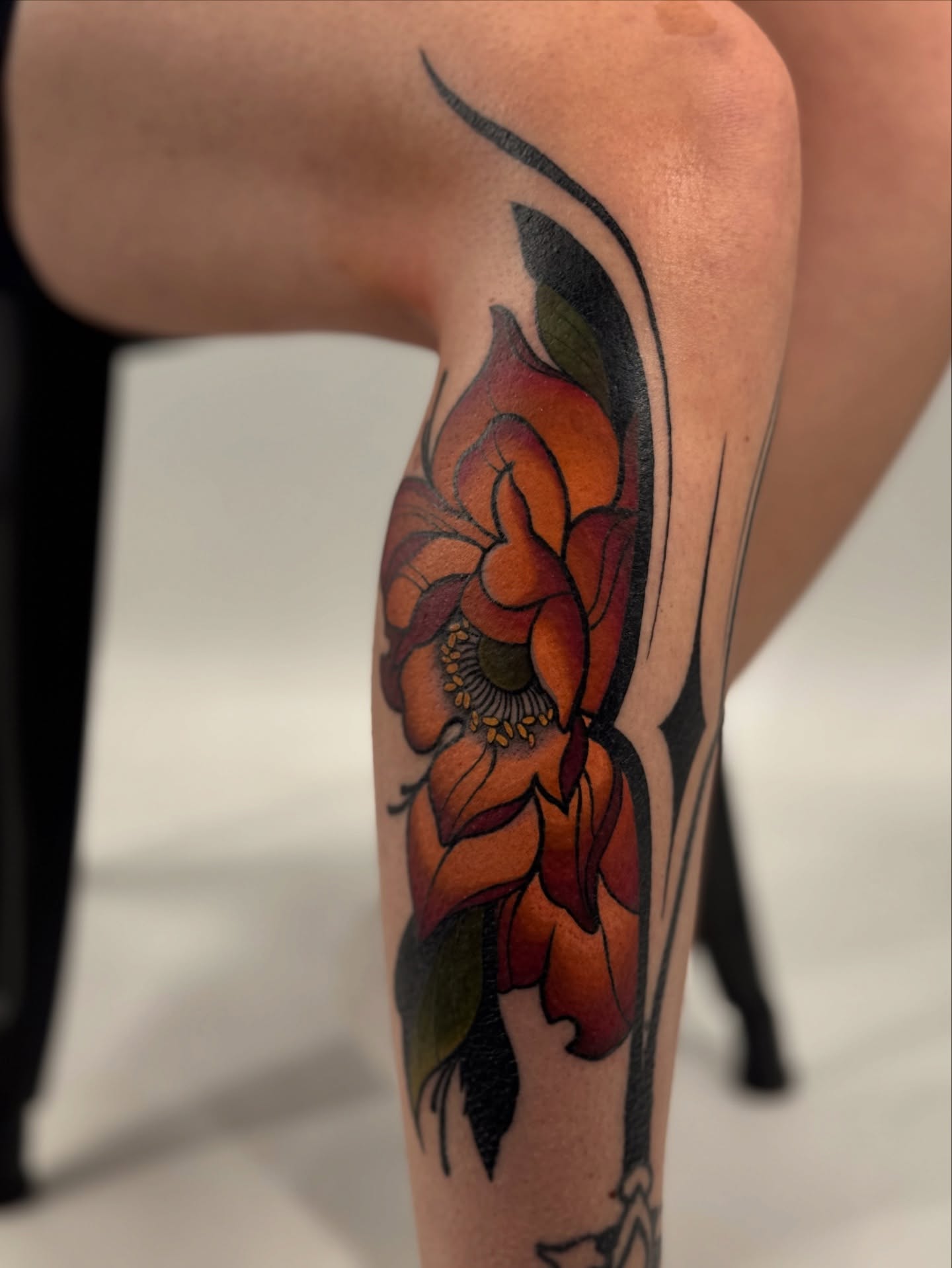 Flower American traditional tattoo on the forearm by Hailey K - Arizona Tattoo Artist, Miami, Florida
