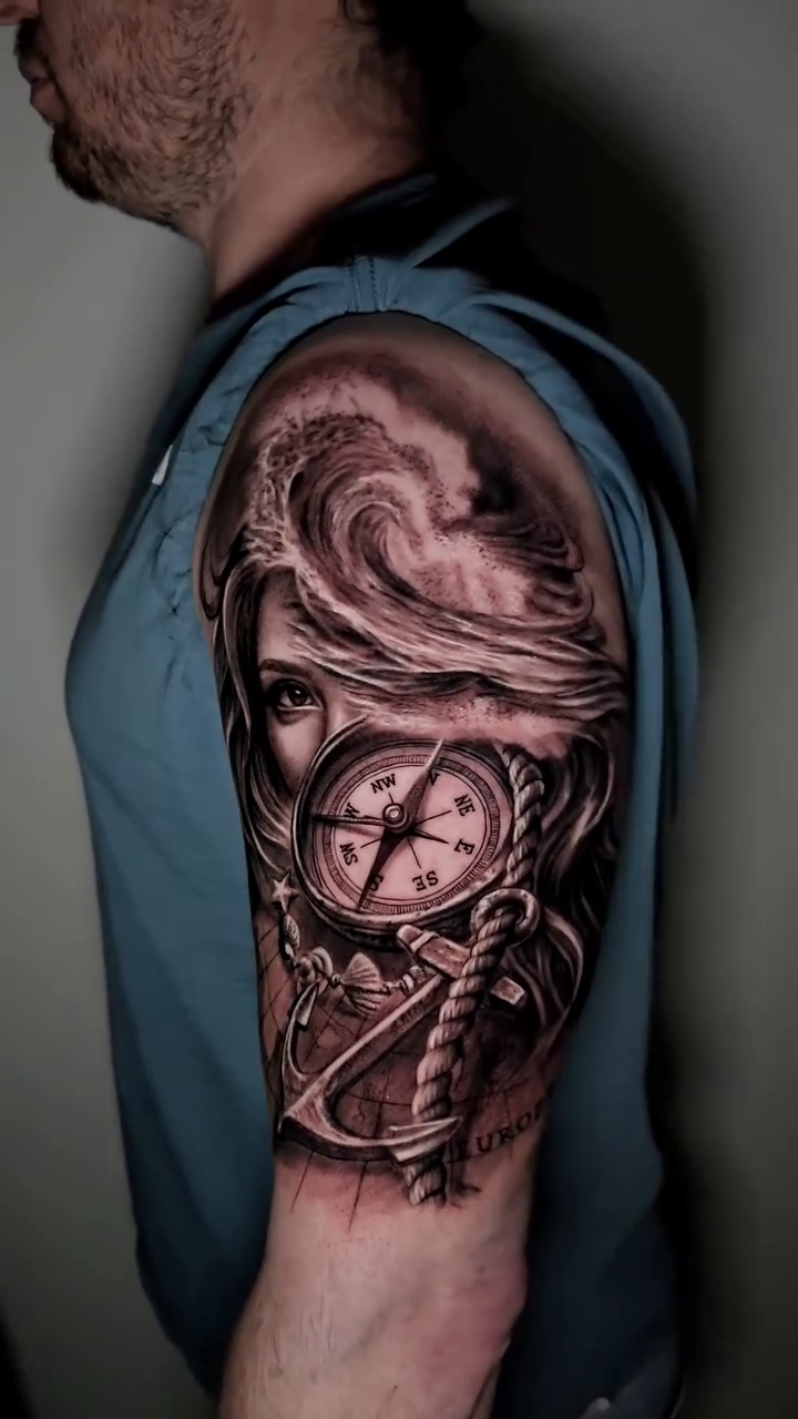 Woman's face with compass and waves realism tattoo by Cipri Suciu