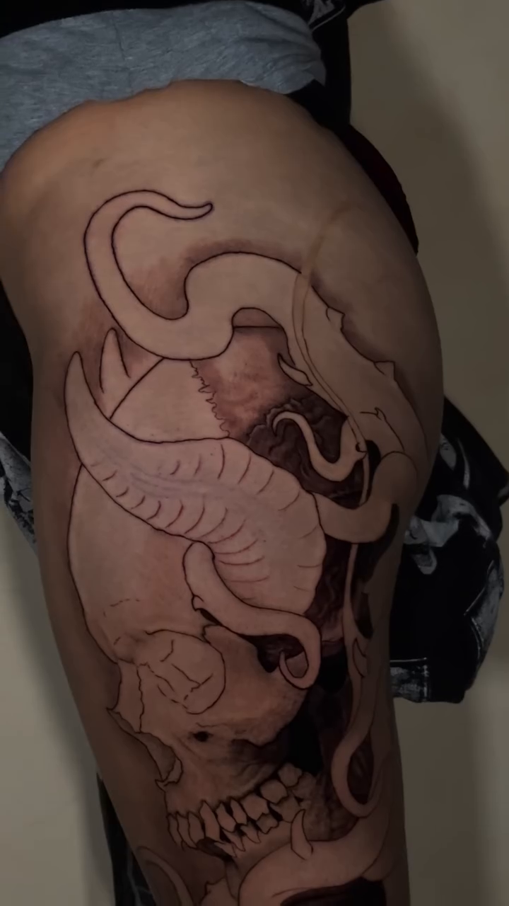 Demon skull with tentacles dark realism tattoo by Isaac
