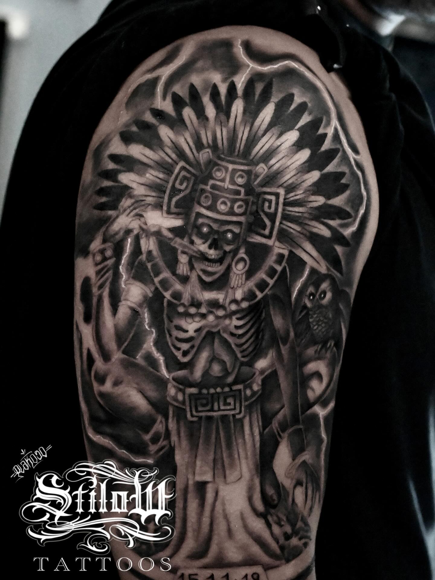 Skeleton in headdress realism tattoo on the shoulder by Stilow Memphis Tattoo Artist, Memphis, Tennessee
