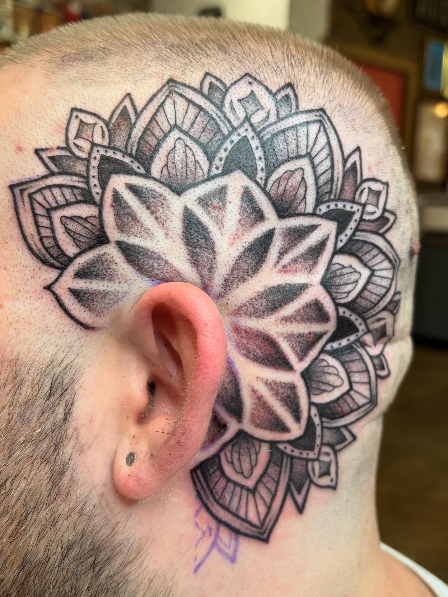 Lotus flower geometric tattoo on the head by Brandi ⛓, Detroit, Michigan